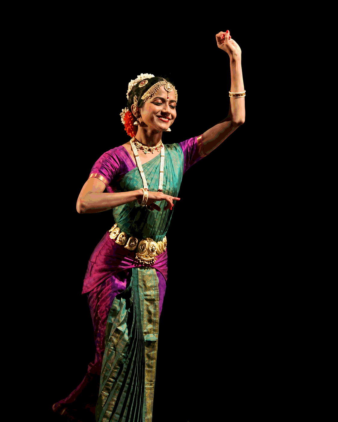 Classical dancer wearing a green sari